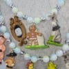 Vintage Shrek en Fiona figuurtjes aan een Statement ketting