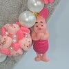 Winnie de Pooh ketting met bijzondere kralen.
