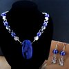 Wintersport & Ontspanning, handgemaakte sieradenset met ketting en ski oorbellen