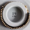 Chic & Sensueel, slangenpatroon armband in zwart en goud