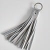 Zilver kleur sleutelhanger met franjes van leer , keyring