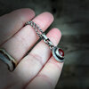 Handgemaakte sterling zilveren hanger met carneool en gegraveerde rand