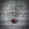 Handgemaakte sterling zilveren hanger met carneool en gegraveerde rand