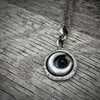 Handgemaakte zilveren hanger met onyx en parelmoer schelp maan