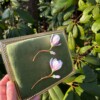 Micro gehaakte magnolia broche