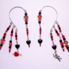 Cupido ear cuffs (paar) - oorhangers met hartjes in rood en zwart