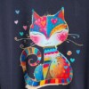 Kunst ontmoet kattenliefde – Het statement-shirt voor creatieve vrouwen
