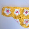 Gehaakt baby vestje | Bolero geel met wit en roze bloemen