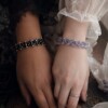 Gouden schaduw & Maanlicht, statement armband met glas kristallen