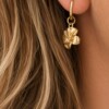 Hibiscus oorbellen goud