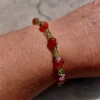 Honey and Grass: armband met vuuragaat en olivijn