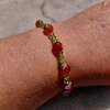 Honey and Grass: armband met vuuragaat en olivijn
