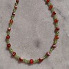 Honey and Grass: ketting van vuuragaat en olivijn