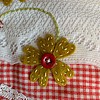 Lief wandkleedje met een vaasje met bloemen