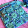 Tas/cross-over band Ocean Blue met schelpjes en Tashanger versiert