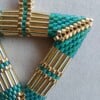 Triangel set van oorbellen en hanger