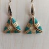 Triangel set van oorbellen en hanger