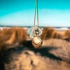 Zeeglas schelp ketting goud