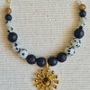 Gouden ketting half schakelketting half edelstenen | Lava