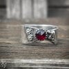 Handgemaakte zilveren ring met roosgeslepen granaat