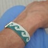 Handgeweven Miyuki kralenarmband waves green