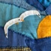 Patchwork wandkleed met meeuwen