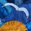 Patchwork wandkleed met meeuwen