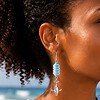 Strandwandeling & Zeezicht, statement oorbellen met bultrug walvissen