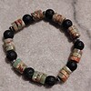 Taurus: stoere armband (m/v) met aquaterra jaspis en basalt