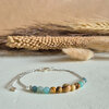 Zilveren armband half edelstenen half ketting