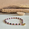 Zomerse armband met tijgeroog en schelpbedel | Shell