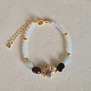 Gouden armband keramieken zeester