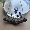 Handgemaakte klaprozenketting met blauw glas en zwart gepatineerd koper