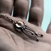 Handgemaakte kwallenketting met transparant glas en zilverkleurig koper