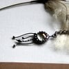Handgemaakte kwallenketting met transparant glas en zilverkleurig koper