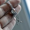 Handgemaakte kwallenketting met transparant glas en zilverkleurig koper