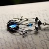 Handgemaakte paddenstoelenclusterketting met blauw glas en zilverkleurig koper