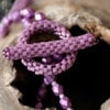 Handgemaakte statement ketting ‘Poppy' pink/amethyst met Swarovski kristallen en Paisley Duo’s – Feest, gala statement