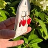 Micro gehaakte klaproos creolen