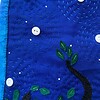 Patchwork wandkleed met de maan en uiltje
