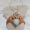 RVS slangenketting met hanger van schelp met Larimar en kristal
