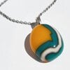 RVS ketting met uniek "Gouden Tij 002" glas hanger