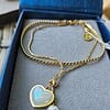 Dubbele armband met hart & parel ā RVS verguld