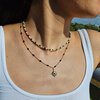 Dubbele RVS ketting – 16K goud verguld met zwarte details & zonhanger