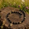 Elegante armband met zwarte Agaat & hartje – RVS 16K verguld