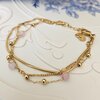 Elegante meerlaagse armband met kwarts – RVS verguld