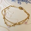Elegante meerlaagse armband met kwarts – RVS verguld