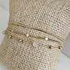 Elegante meerlaagse armband met kwarts – RVS verguld
