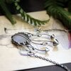 Handgemaakte paddenstoelenketting met glas en zilverkleurig koper