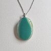 Kustbeweging - RVS ketting met uniek glas hanger
